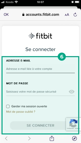 écran de connexion à l'application fitbit avec les champs d'adresse e-mail et de mot de passe mis en surbrillance